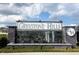 The Greystone Hills waterfall signage offers a visually appealing entrance to the community at 8899 Sw 50Th Ave, Ocala, FL 34476