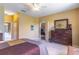 Spacious bedroom featuring a large window, carpet flooring and neutral color paint at 9458 Sw 93Rd Loop, Ocala, FL 34481