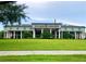 The Circle Square Cultural Center behind a grass lawn on a bright day at 9458 Sw 93Rd Loop, Ocala, FL 34481