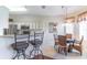 Charming breakfast nook with plenty of seating and lots of natural light at 9458 Sw 93Rd Loop, Ocala, FL 34481