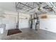Spacious garage equipped with overhead storage racks and open shelving, offering versatile space for storage and organization at 9458 Sw 93Rd Loop, Ocala, FL 34481