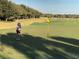 Personal putting on a sunny golf course at 9458 Sw 93Rd Loop, Ocala, FL 34481