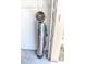 Water treatment system against a white wall in the garage at 9458 Sw 93Rd Loop, Ocala, FL 34481
