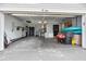 This is an attached two car garage offering ample storage and access to the home at 12453 Se 61St Ct, Belleview, FL 34420