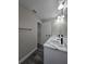 Bathroom featuring double sinks and marble countertops at 13 Locust Trak, Ocala, FL 34472