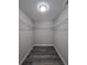 Walk-in closet with wire shelving and modern floors at 13 Locust Trak, Ocala, FL 34472
