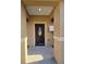 Inviting front entryway featuring a dark-stained door with decorative glass at 13 Locust Trak, Ocala, FL 34472
