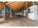 Bright and airy barn interior with ample stall space and good ventilation, ensuring the well-being of the horses at 13800 Ne Jacksonville Road, Citra, FL 32113