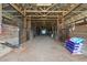 Clean barn interior with wooden stalls and a central aisle, providing a safe and comfortable environment for horses at 13800 Ne Jacksonville Road, Citra, FL 32113