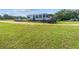 Spacious lot with a well-maintained RV, recreational vehicles, and lush green grass at 13800 Ne Jacksonville Road, Citra, FL 32113