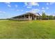 Well-maintained horse barn with ample space and a clean design, perfect for housing and caring for horses at 13800 Ne Jacksonville Road, Citra, FL 32113