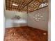 Bright horse stall with white walls, wooden roof, and lattice block windows at 13800 Ne Jacksonville Road, Citra, FL 32113