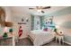 Stylized bedroom with coastal decor, patterned accent wall, and a comfortable bed at 14781 Sw 22Nd Court Rd, Ocala, FL 34473