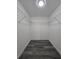 Walk-in closet with wire shelving and modern gray flooring at 17 Laurel Pass Ln, Ocala, FL 34480