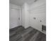 Laundry room with wire shelving and hookups offers convenience and efficiency at 17 Laurel Pass Ln, Ocala, FL 34480