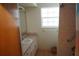 Modest bathroom featuring a vanity, tiled shower, and ample natural light from a window at 1764 Se 169Th Avenue Rd, Silver Springs, FL 34488