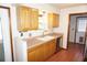 Functional kitchen featuring wood cabinets, stainless steel appliances, and tile floors at 1764 Se 169Th Avenue Rd, Silver Springs, FL 34488