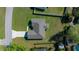 Bird's-eye view of the home displays its roof, driveway, and surrounding grassy yard at 3010 Sw 137Th Pl, Ocala, FL 34473