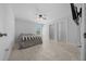 Bedroom featuring tile floors, a ceiling fan, and a window with natural light at 3010 Sw 137Th Pl, Ocala, FL 34473
