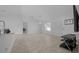 Bright open-concept area boasts tile flooring and modern fixtures at 3010 Sw 137Th Pl, Ocala, FL 34473