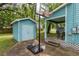 View of the side of the house with basketball hoop and shed at 307 Nw 10Th Ave, Ocala, FL 34475