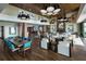 Large clubhouse with a dining table and multiple seating arrangements for large gatherings at 3990 Nw 48Th Terrace Rd, Ocala, FL 34482