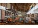 Modern bar and restaurant area with a vaulted wood ceiling, exposed brick, and an open dining area at 3990 Nw 48Th Terrace Rd, Ocala, FL 34482