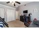 Bedroom featuring a closet, a desk, and a TV at 4245 Se 24Th Ter, Ocala, FL 34480