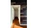 Hallway with wood flooring and access to multiple rooms at 43 Pine Radl, Ocala, FL 34472