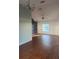Bright living room with a large window, open space, and hardwood floors at 43 Pine Radl, Ocala, FL 34472