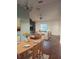 Open-concept living room with a dining area and stylish decor at 43 Pine Radl, Ocala, FL 34472