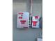 Solar power system components featuring a shutoff switch and inverter mounted on exterior wall at 43 Pine Radl, Ocala, FL 34472