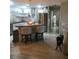 Eat-in kitchen with stainless appliances and stylish countertop seating at 509 Del Mar Dr, Lady Lake, FL 32159
