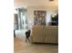 Bright living room with hardwood floors and an eclectic mix of modern and vintage decor at 509 Del Mar Dr, Lady Lake, FL 32159