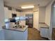 Well-equipped kitchen boasts stainless steel appliances and ample counter space for cooking convenience at 6767 Sw 114Th Street Rd, Ocala, FL 34476