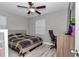 Bedroom with a ceiling fan, a window and a full size bed at 736 Ne 26 Ter, Ocala, FL 34470