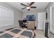 Bedroom with a ceiling fan, a window and a full size bed at 736 Ne 26 Ter, Ocala, FL 34470