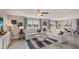 Inviting living room with comfortable seating, bright windows, and stylish decor at 8652 Sw 44Th Ter, Ocala, FL 34476