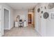 Office area with neutral walls, carpet floors and a computer desk and stool at 8658 Sw 44Th Ter, Ocala, FL 34476