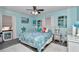 Bedroom featuring a blue color scheme, ceiling fan, and coastal decor at 9844 Sw 198Th Cir, Dunnellon, FL 34432