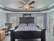 Comfortable bedroom featuring a ceiling fan, and carpeted floors at 1034 Se 65Th Cir, Ocala, FL 34472