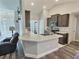Well-designed kitchen with granite countertops, stainless appliances, and an island, perfect for cooking and entertaining at 1034 Se 65Th Cir, Ocala, FL 34472