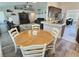 Open-concept living space with updated kitchen, dining area, and comfortable living room at 1034 Se 65Th Cir, Ocala, FL 34472