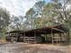 Exterior of barn with wooden structure and ample space at 1370 Nw 120Th Ave, Ocala, FL 34482