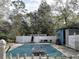 Inground swimming pool with covered surface and fenced surround at 1370 Nw 120Th Ave, Ocala, FL 34482