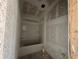 New bathroom with a tub and shower combo featuring white fixtures, ready for customization at 4413 Sw 90Th Pl, Ocala, FL 34476