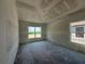 Bedroom with multiple windows offering natural light, ready for customization with raw walls at 4413 Sw 90Th Pl, Ocala, FL 34476