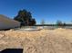 The foundation is poured with a view of the trees and a clear blue sky, ready for the next stage of construction at 4413 Sw 90Th Pl, Ocala, FL 34476