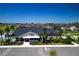 Aerial view of the community clubhouse featuring a pool and outdoor amenities at 7014 Elaine Ct, The Villages, FL 34762