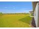 Large green lawn backyard with view at 8491 Sw 52Nd Lane Rd, Ocala, FL 34481